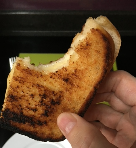 Eating-grilled-cheese
